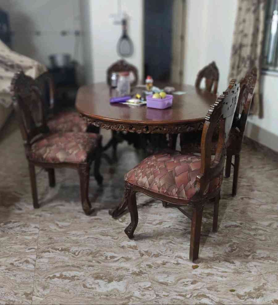 large dining table with 6 chairs