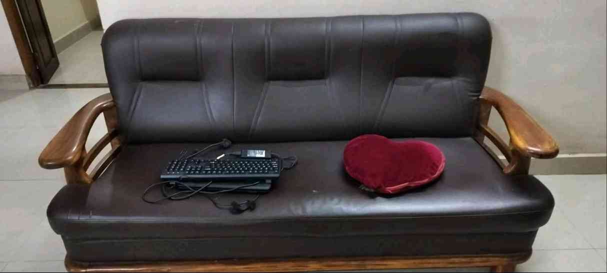wood sofa and dinning table