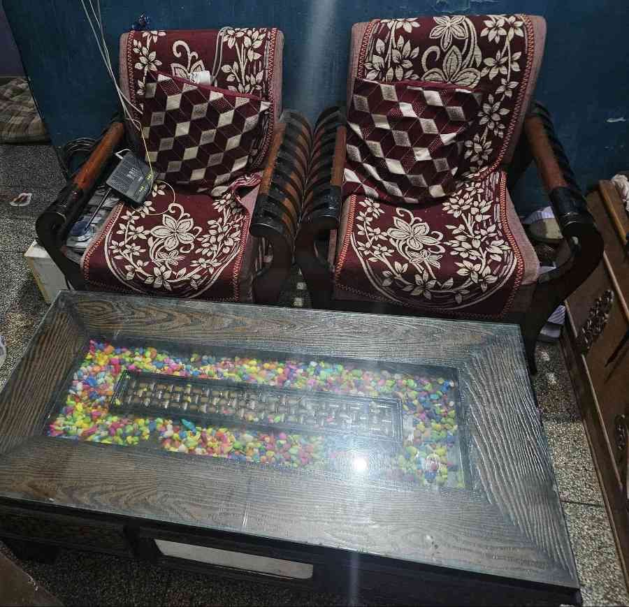 3 piece sofa set with a wooden coffee table